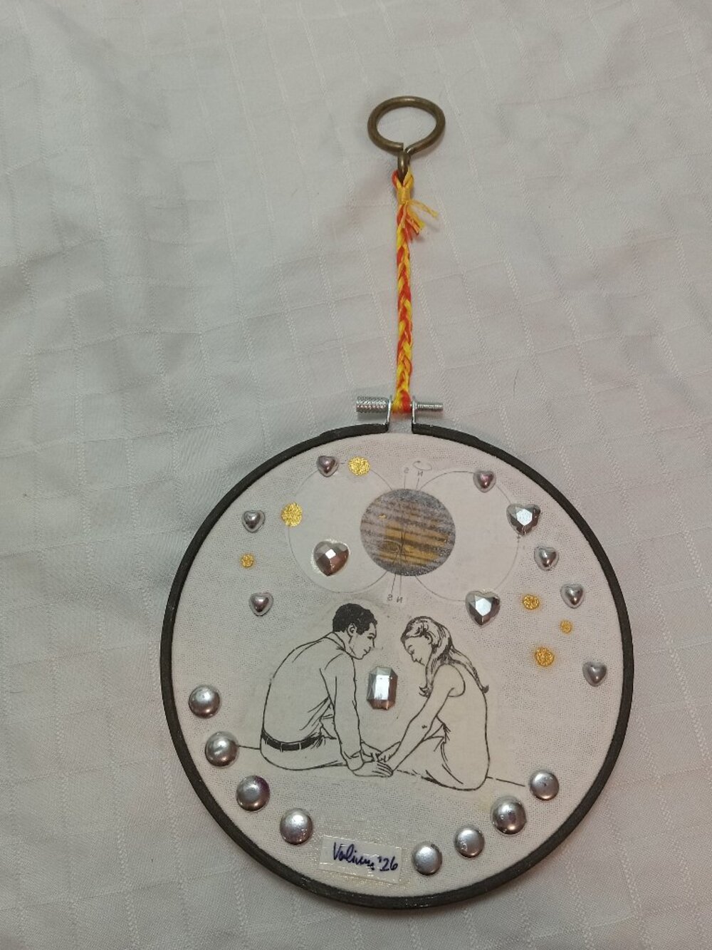 Handmade prints of old magazines on cotton & mixed media in a cross-stitch hoop